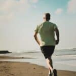 Man Jogging on Beach