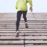 Woman Sprinting Up Stairs